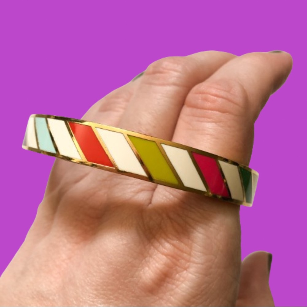 Kate Spade “Flying Colors” enamel & goldtone bangle bracelet
